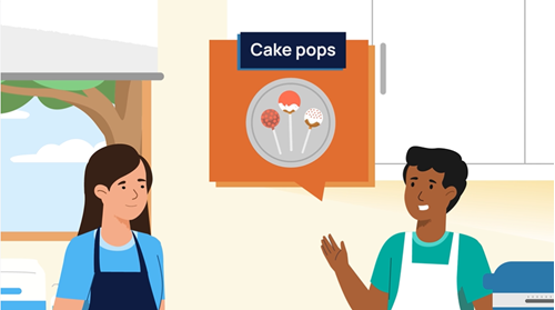 Two people wearing aprons in a kitchen. 