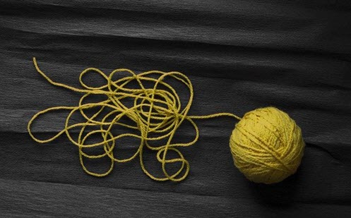 Photo of a ball of yellow string