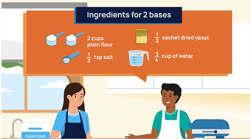 Two people wearing aprons in a kitchen.
